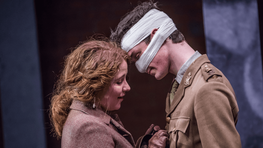 A still from the Lyric Drama Studio's production of Dracula, featuring two actors on stage.