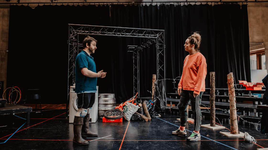 Behind the scenes image of The Border Game rehearsal